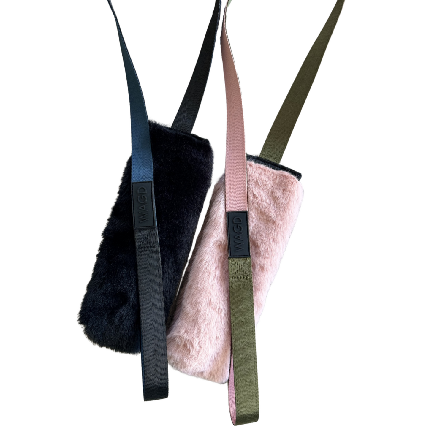 2 tug toys side by side one with ink fluff and one with black fluff and long handles
