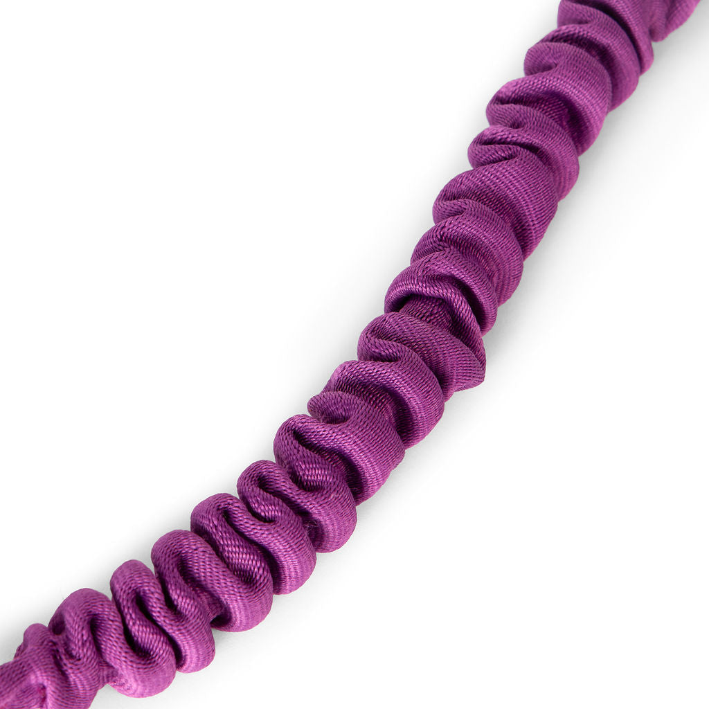 Purple bungee close up on a white background