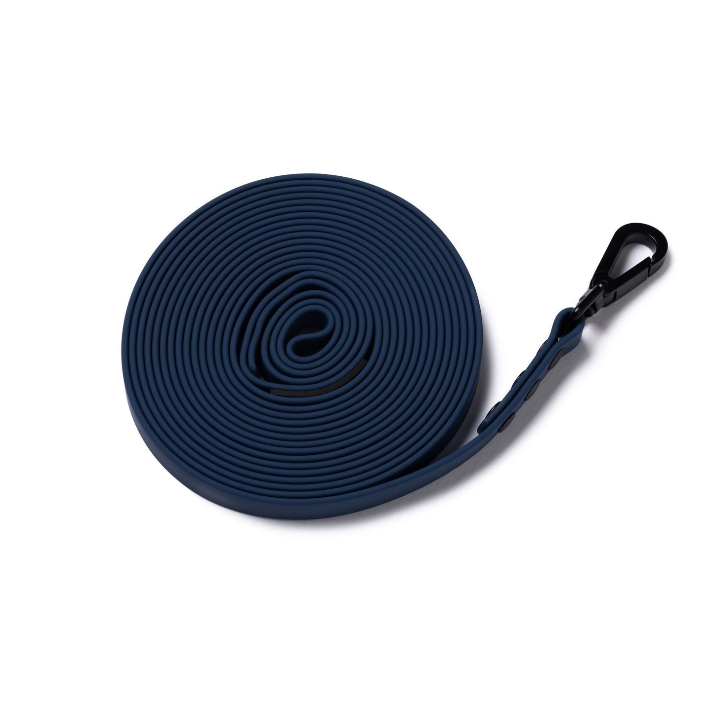 A navy 5m rubber coated lead rolled up and laid flat on a white background.