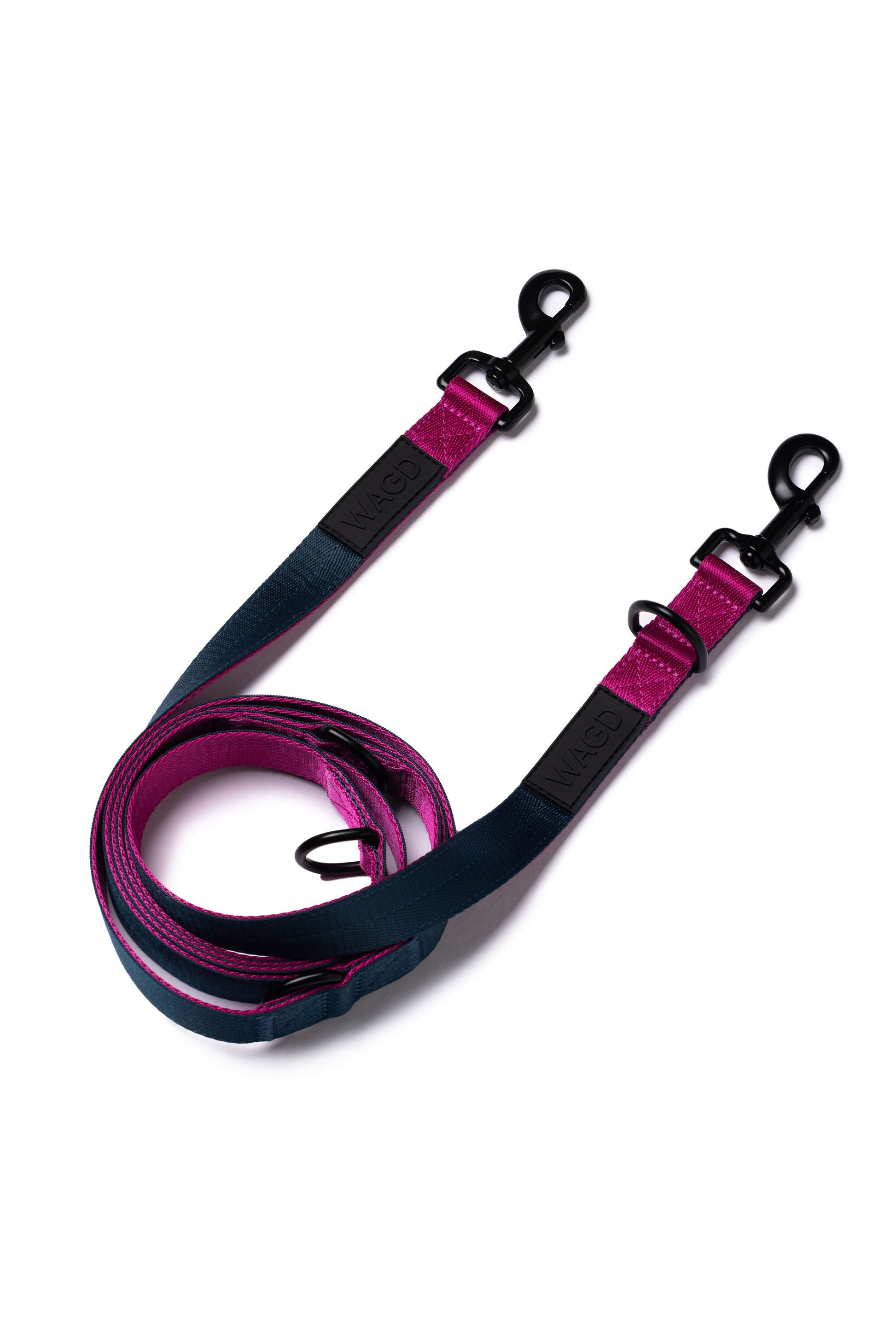Multi length lead in Peacock and Pink with 2 black metal clips at either end and with WAGD rubber logo. 